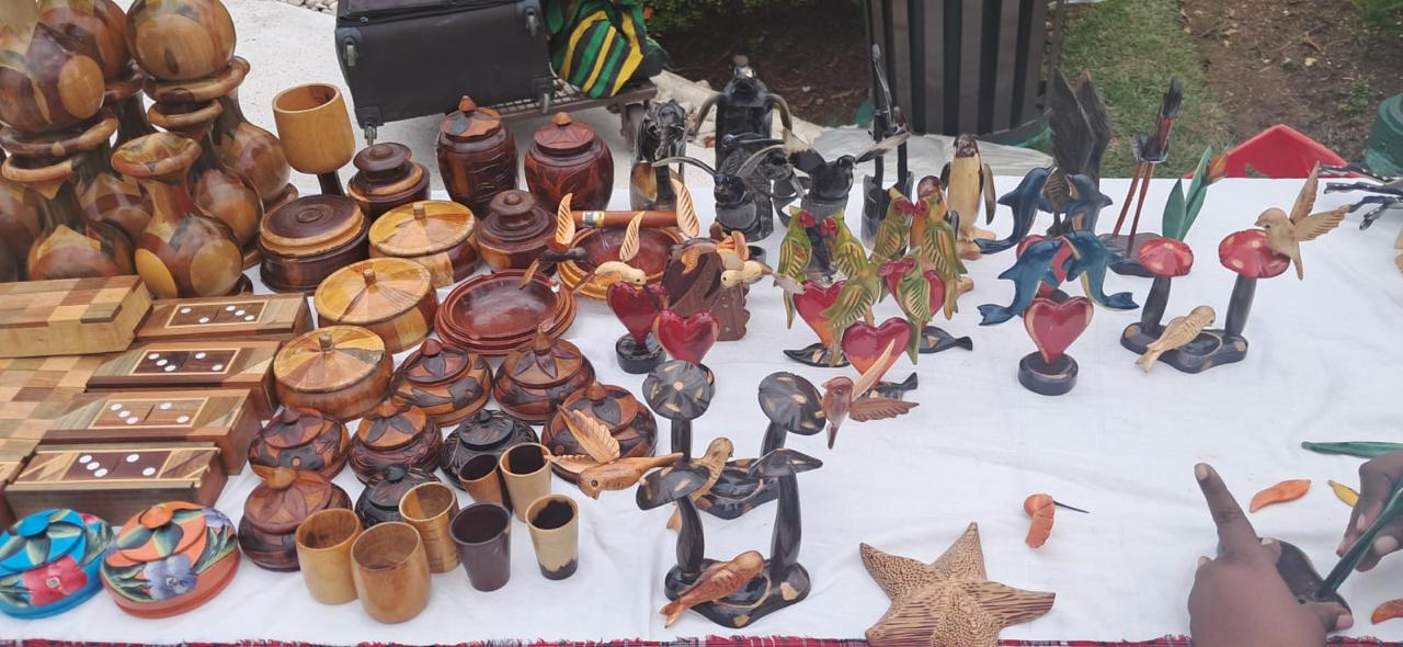 Hand-carved wooden bowls, figurines and keepsakes at a Jamaican craft stall